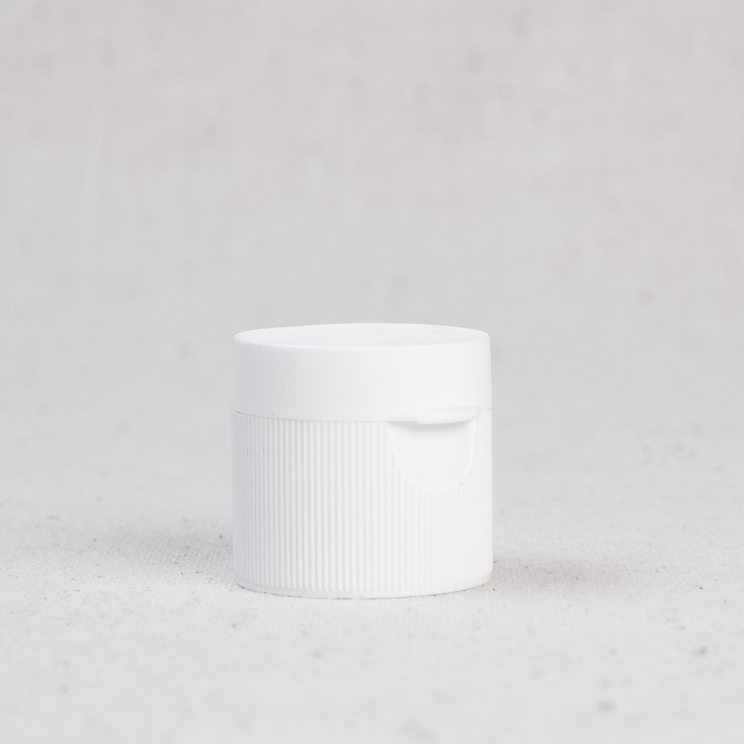 White Plastic 24/410 Ribbed Skirt Hinged Flip-Top Snap Cap